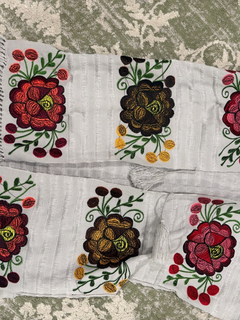 Embroidered Floral White Fringe vest with Red and Brown Blooms